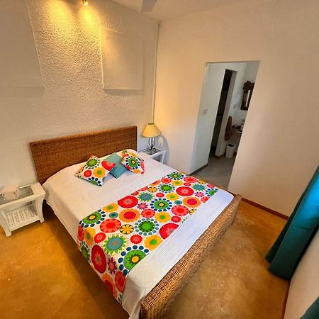 Roche Island Bungalows غراند بايَ المظهر الخارجي الصورة